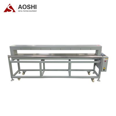 Stroj za pregledovanje igel z dolgimi trakovi